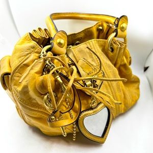 Y2K Juicy Couture yellow leather purse.